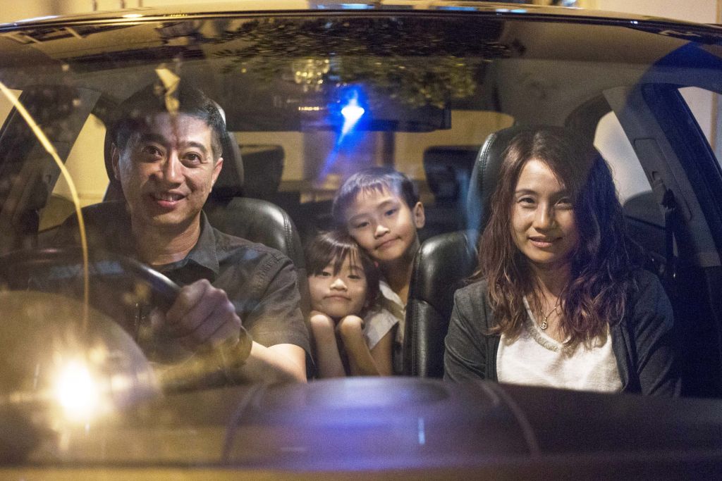 Mr-Toni-Teh-and-his-wife-Madam-Charlemagne-Lim-with-two-of-their-three-children-Isabelle-Teh-and-Russell-Teh-in-their-family-car.-Photo-Wong-Pei-Ting.jpg